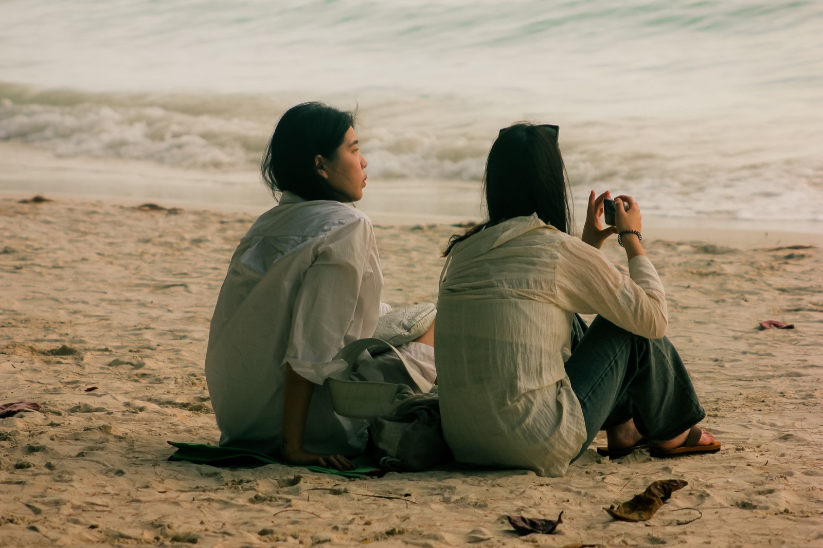 Two friends spending time together at the beach